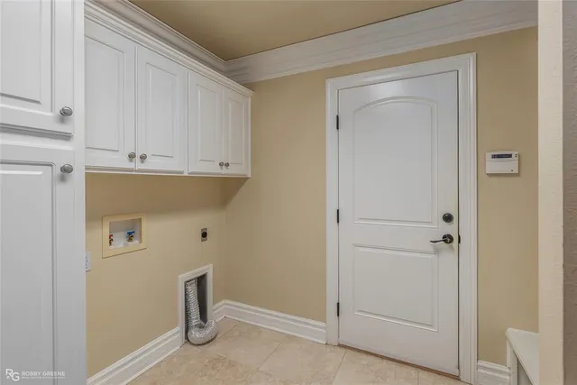 a view of cabinets and utility room