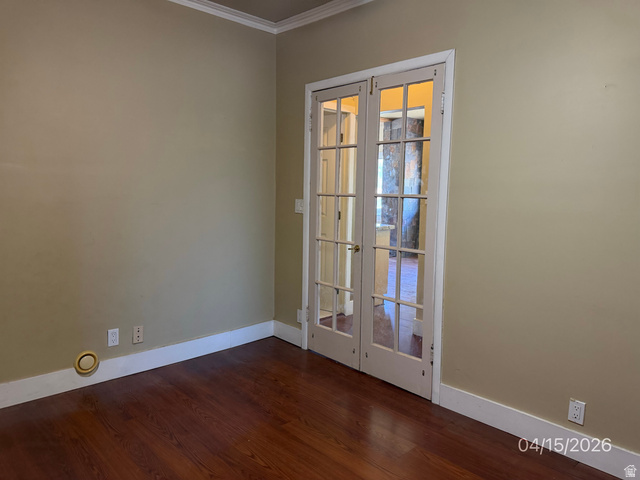 250 South Main Street Fillmore, UT 84631 - Photo 9 of 12 Unfurnished room with french doors, dark wood-style floors, and crown molding