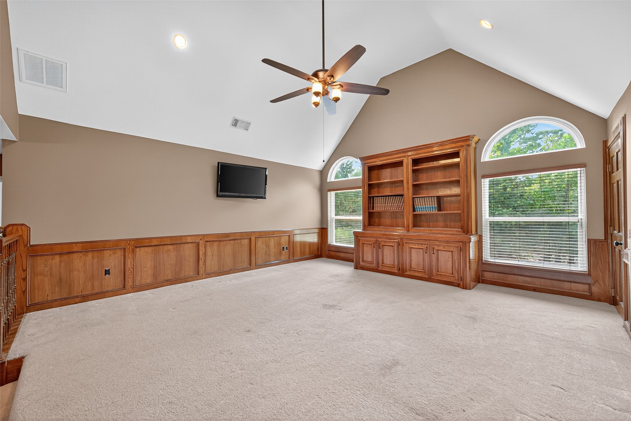 1519 Lofty Maple Trail Houston, TX 77345 - Photo 40 of 49 Large gameroom upstairs with an additional room to be used as additional storage or home office.