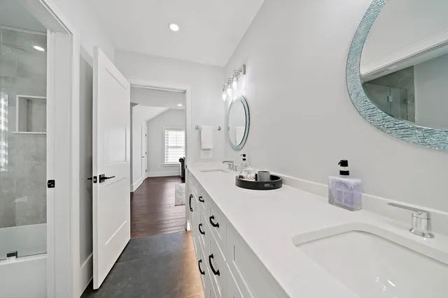 a bathroom with a sink and a mirror