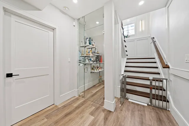 a view of entryway with wooden floor