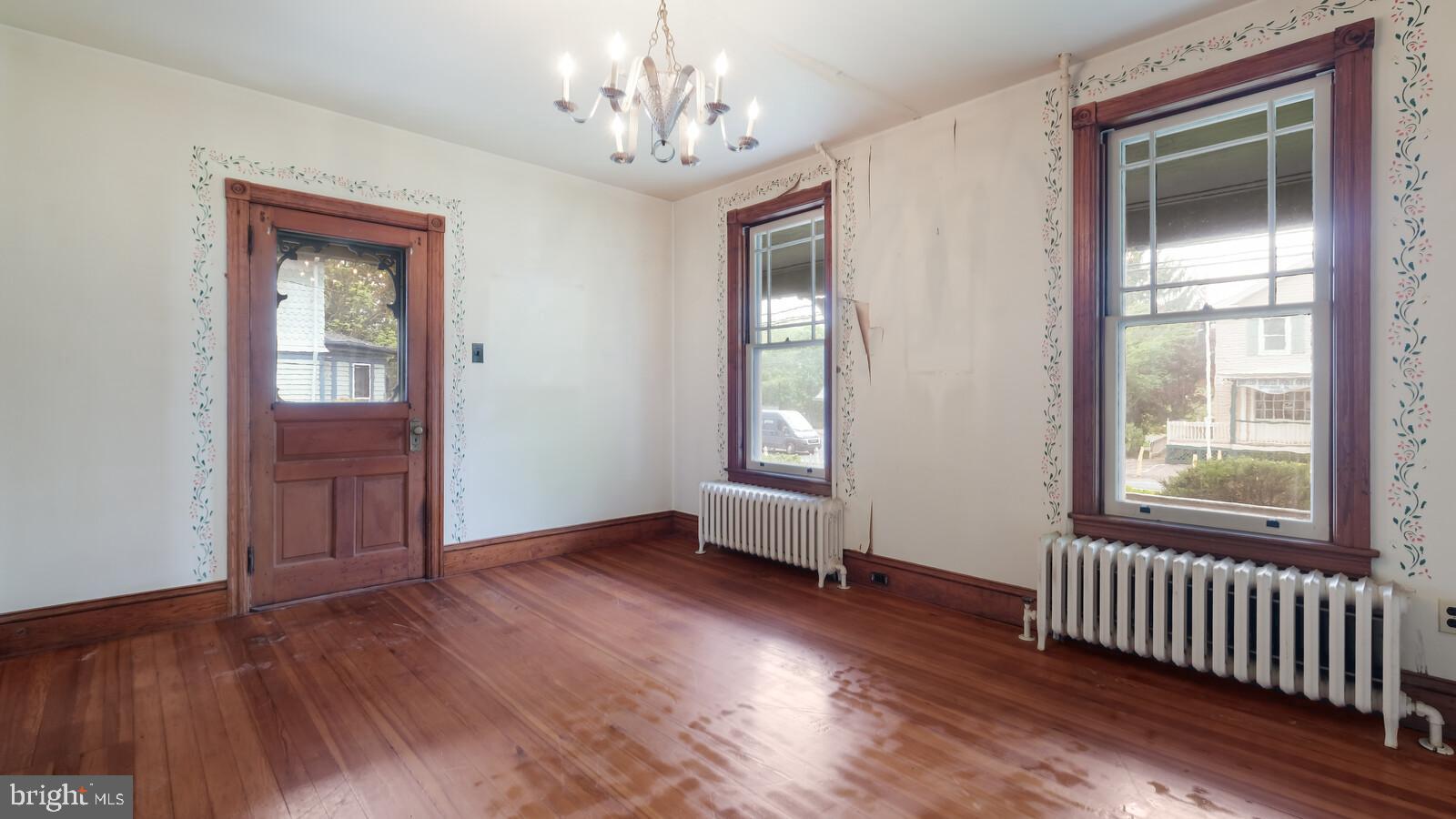 805 Township Line Road Newtown, PA 18940 - Photo 16 of 40 Living Room with Door to Side Porch