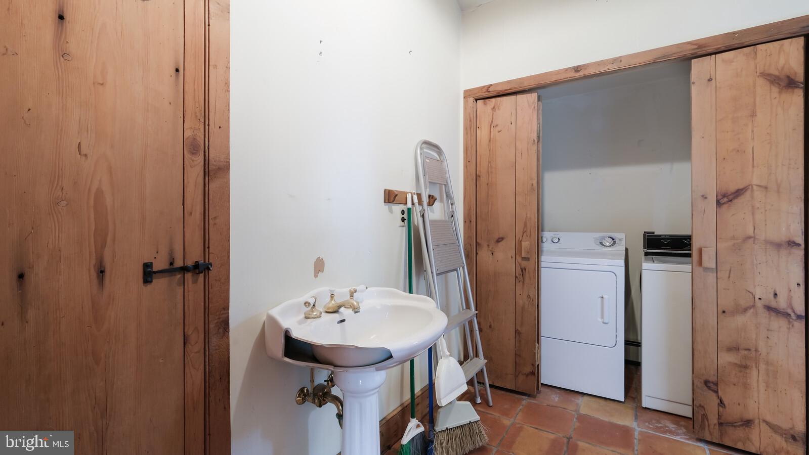 805 Township Line Road Newtown, PA 18940 - Photo 29 of 40 Half Bath & Laundry Room