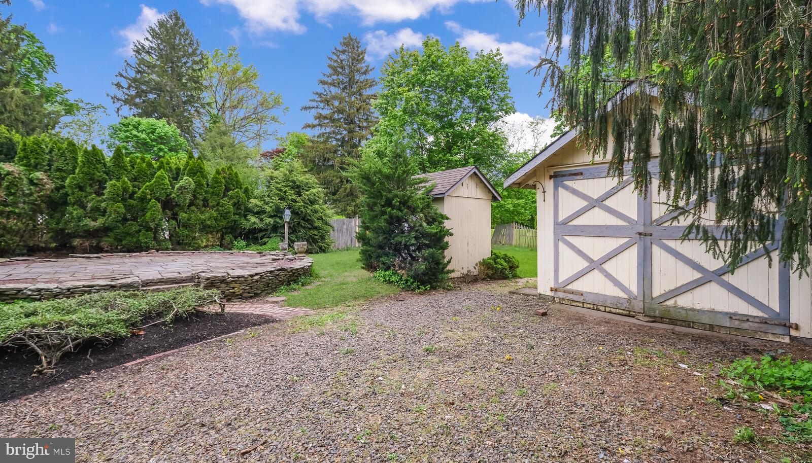 805 Township Line Road Newtown, PA 18940 - Photo 32 of 40 Rear patio, Shed and Garage