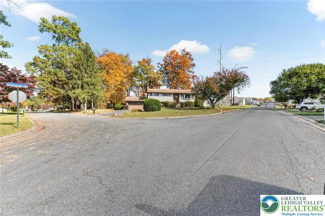 a view of a street with houses