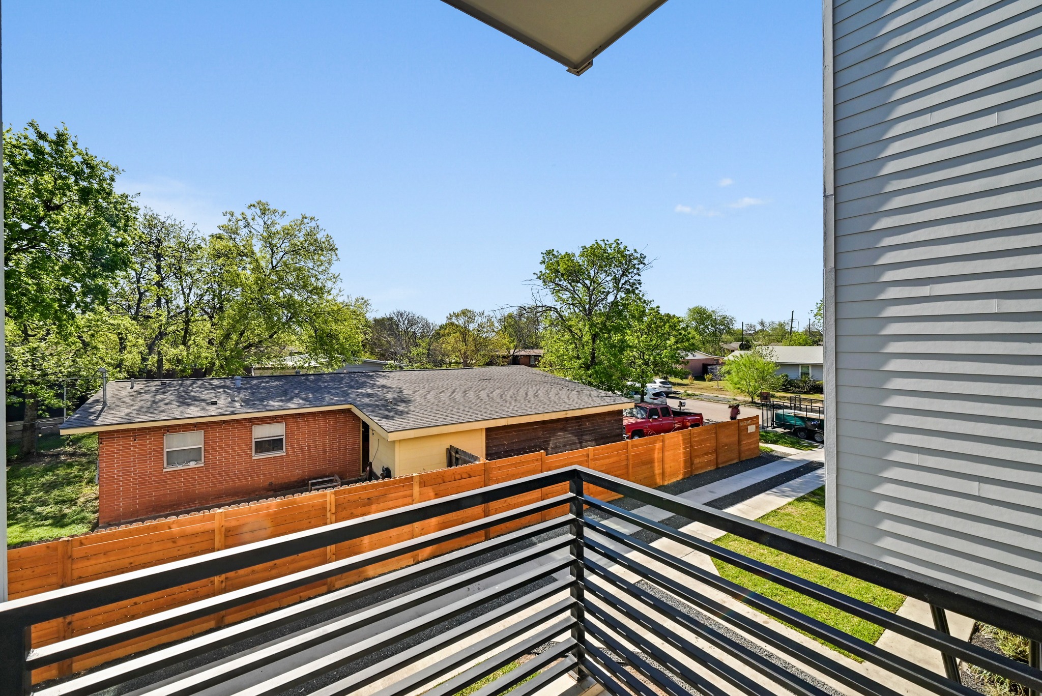 100 West Odell Street, Unit 1 Austin, TX 78752 - Photo 22 of 39 a view of a balcony with chairs