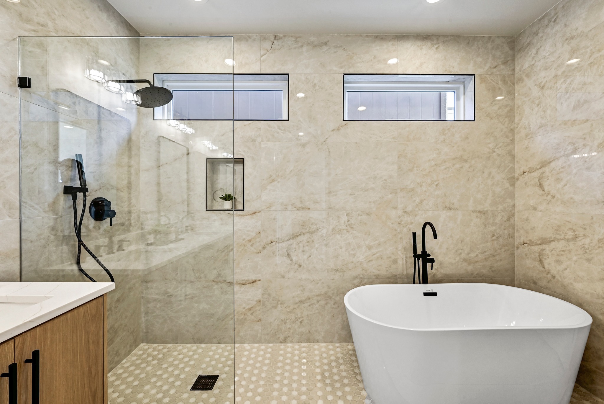 100 West Odell Street, Unit 1 Austin, TX 78752 - Photo 29 of 39 a white bath tub sitting in a bathroom