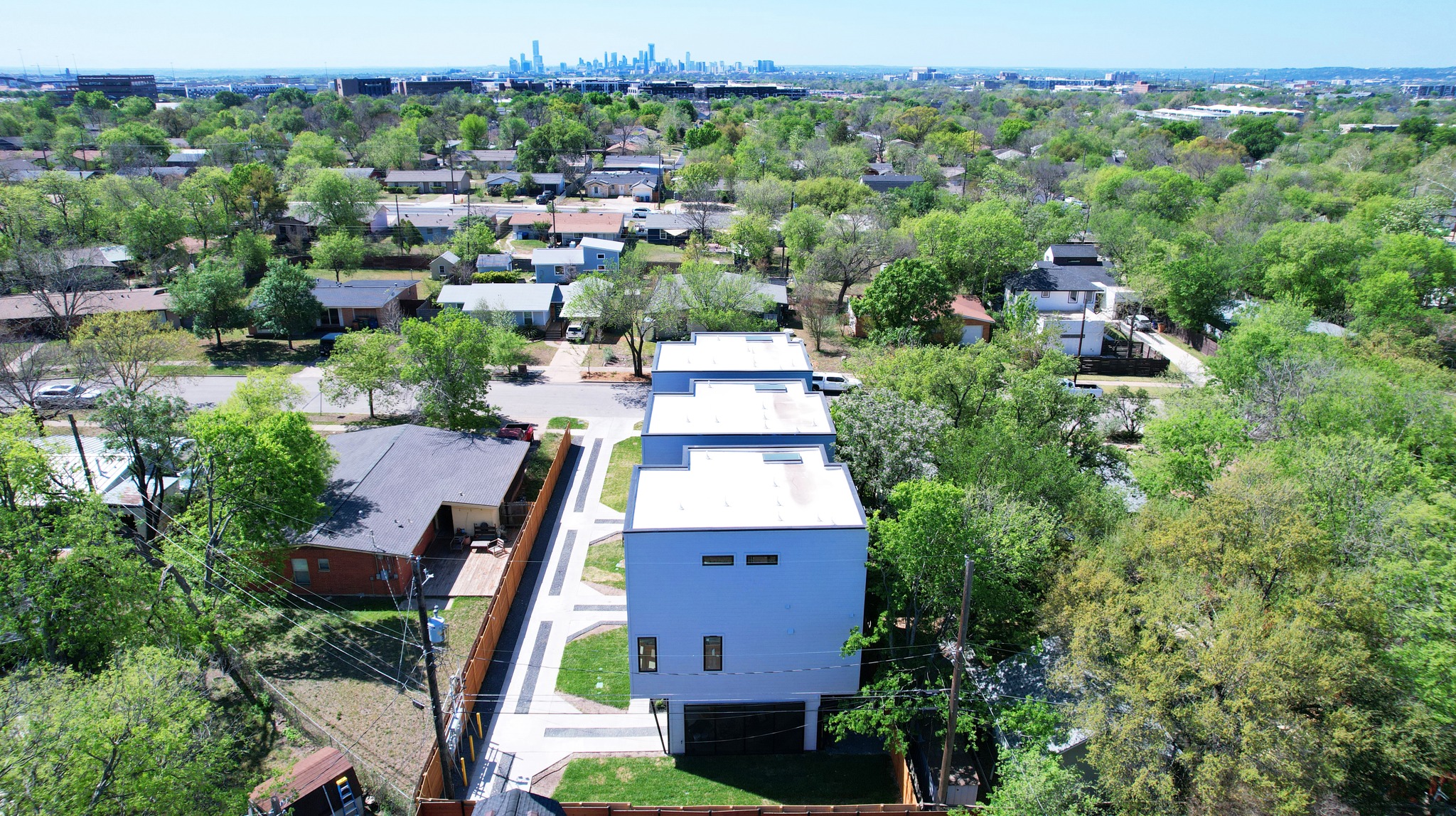100 West Odell Street, Unit 1 Austin, TX 78752 - Photo 34 of 39 an aerial view of a house with a yard and lake view