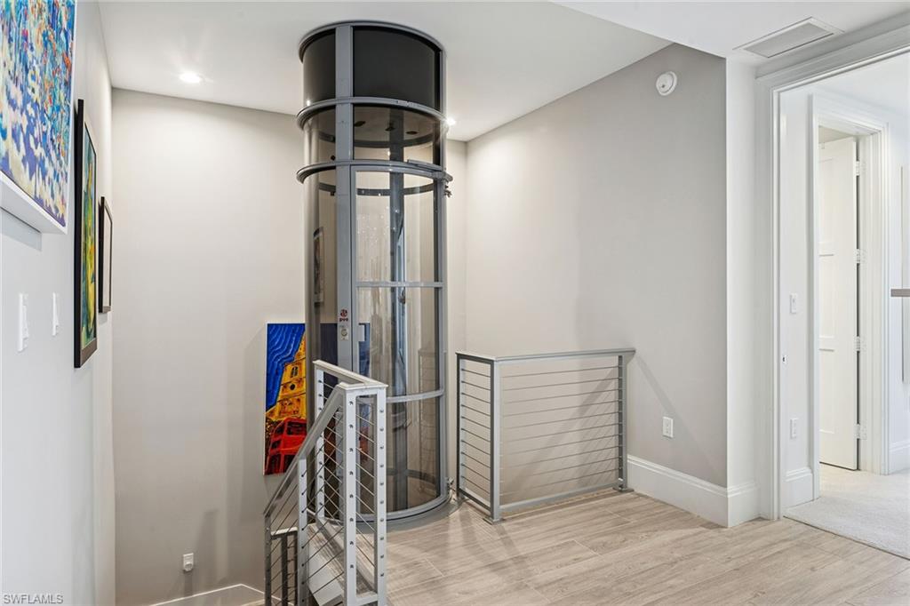 1135 3rd Avenue South, Unit 119 Naples, FL 34102 - Photo 28 of 50 a view of a room with gym equipment