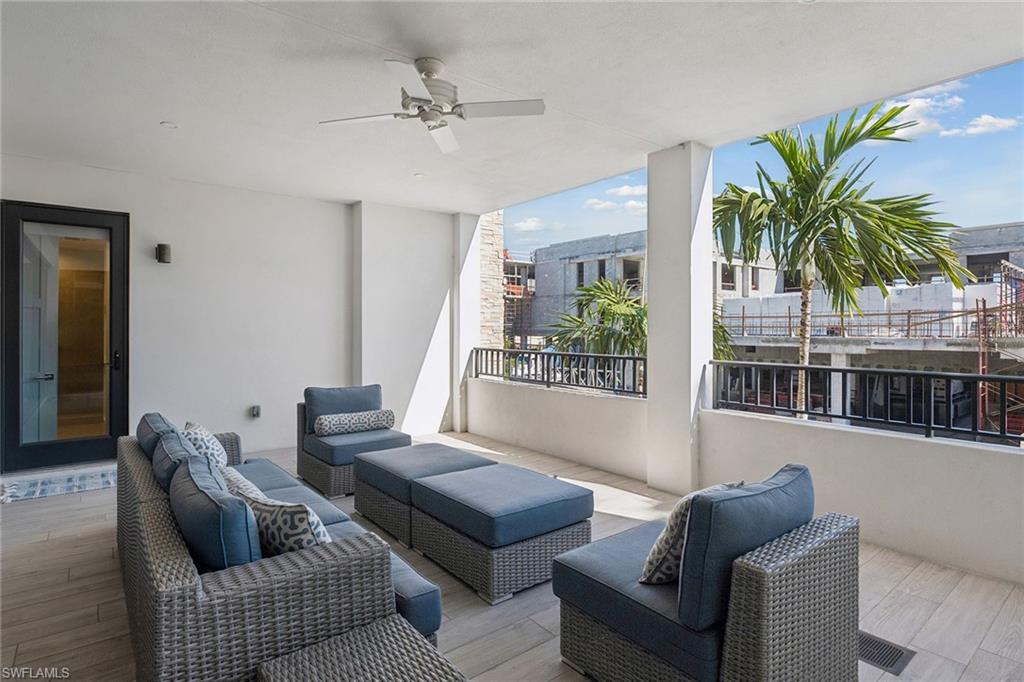 1135 3rd Avenue South, Unit 119 Naples, FL 34102 - Photo 37 of 50 a living room with furniture and a potted plant