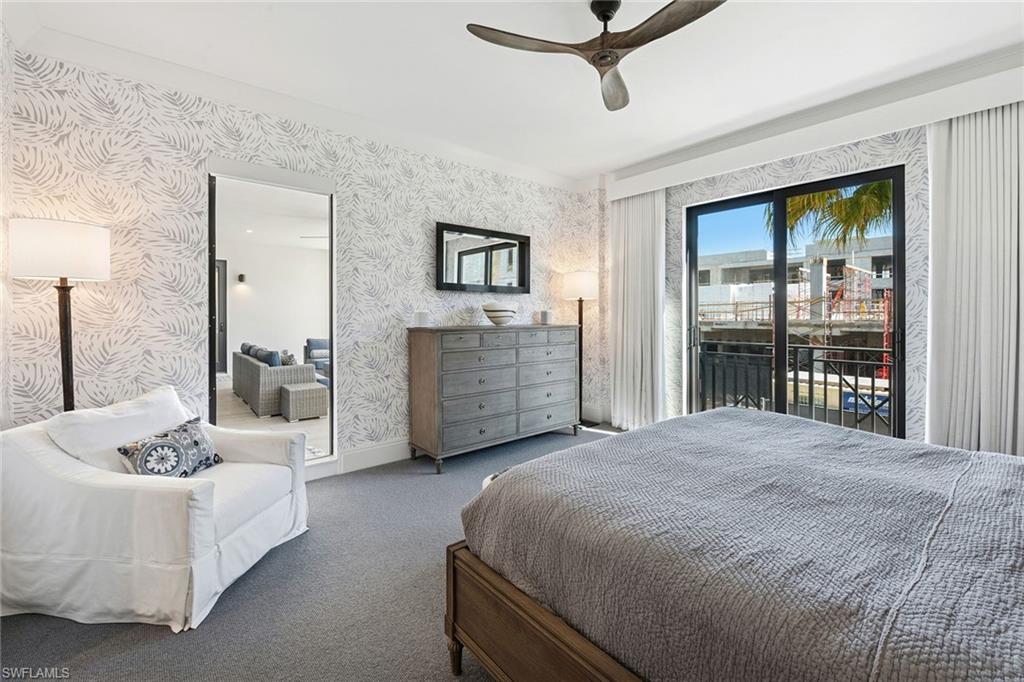 1135 3rd Avenue South, Unit 119 Naples, FL 34102 - Photo 41 of 50 a living room with furniture and a window