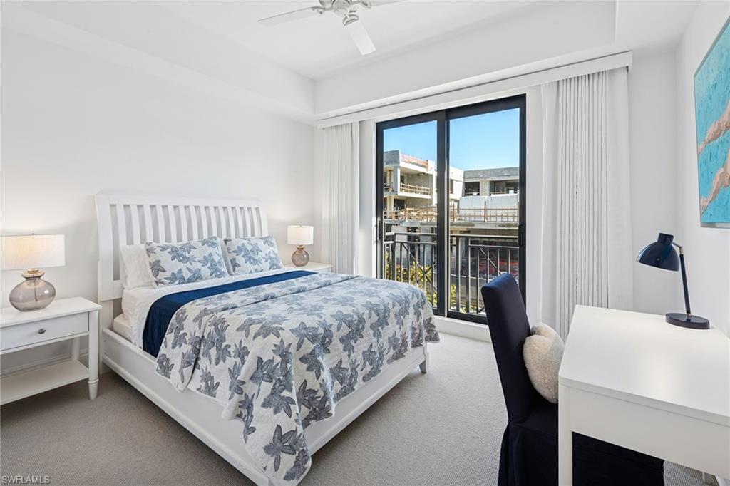 1135 3rd Avenue South, Unit 119 Naples, FL 34102 - Photo 46 of 50 a bedroom with bed and a window