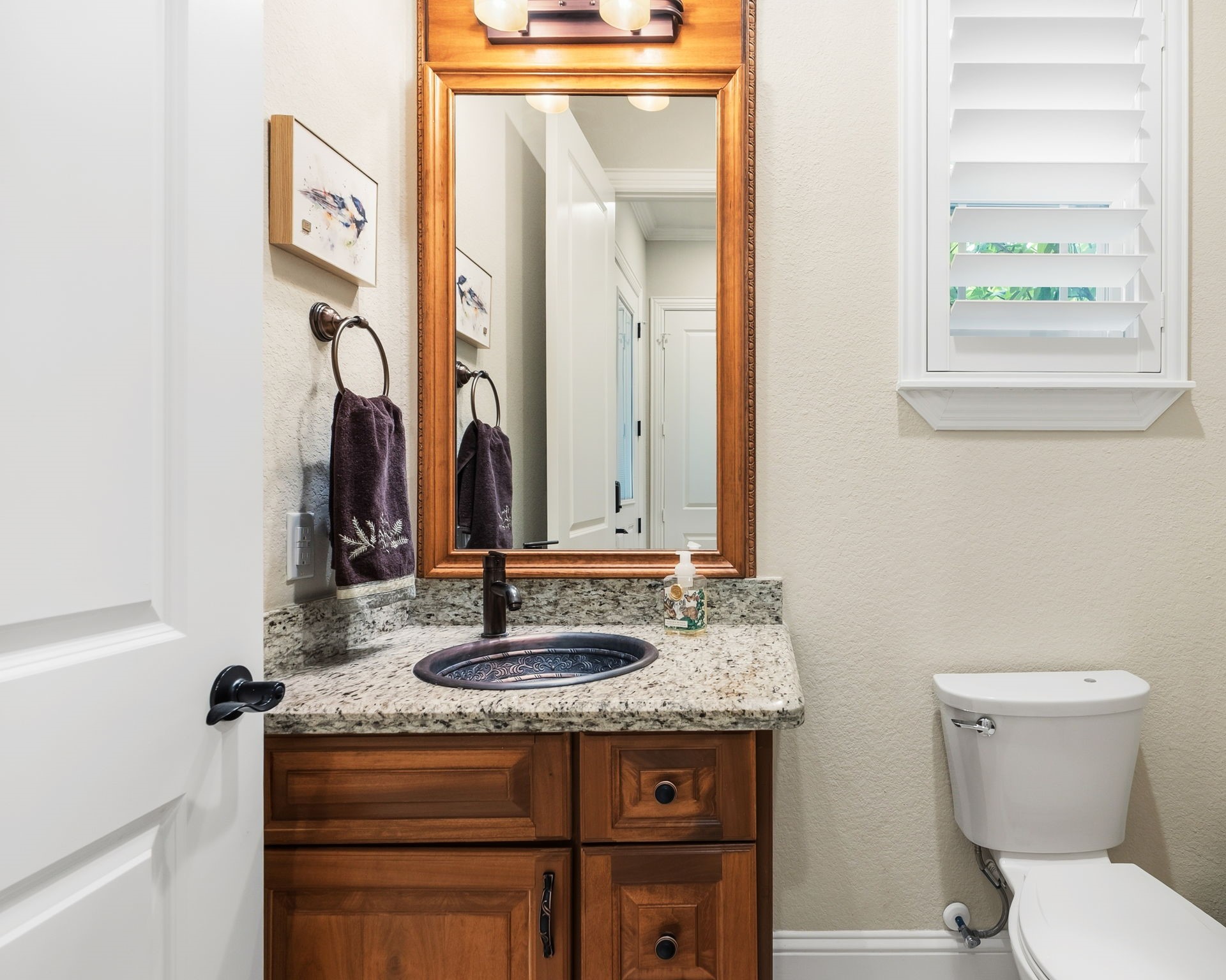 28502 Crawford Ridge Court Huffman, TX 77336 - Photo 33 of 50 a bathroom with a granite countertop sink and a toilet