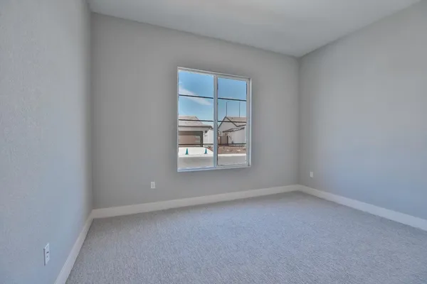 a view of house with backyard and space