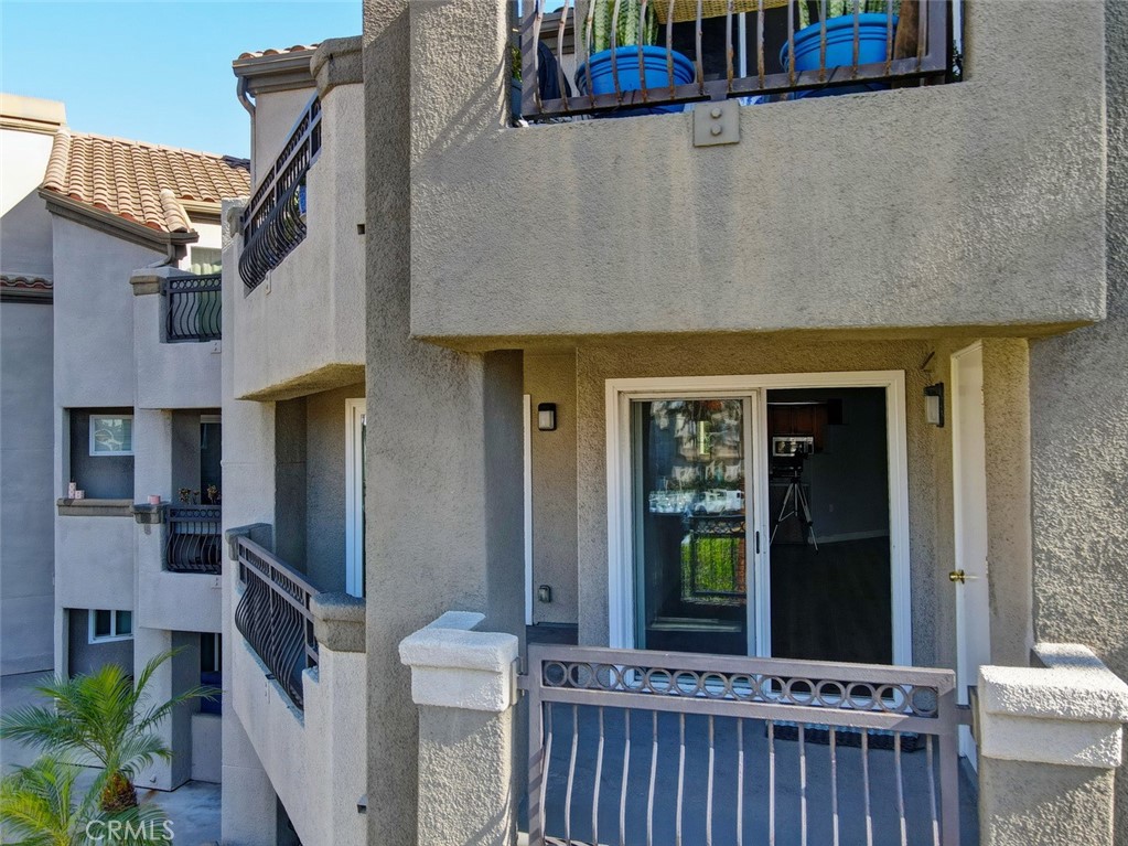 310 Lake Street Huntington Beach, CA 92648 - Photo 11 of 38 a view of a house with brick wall and a large window