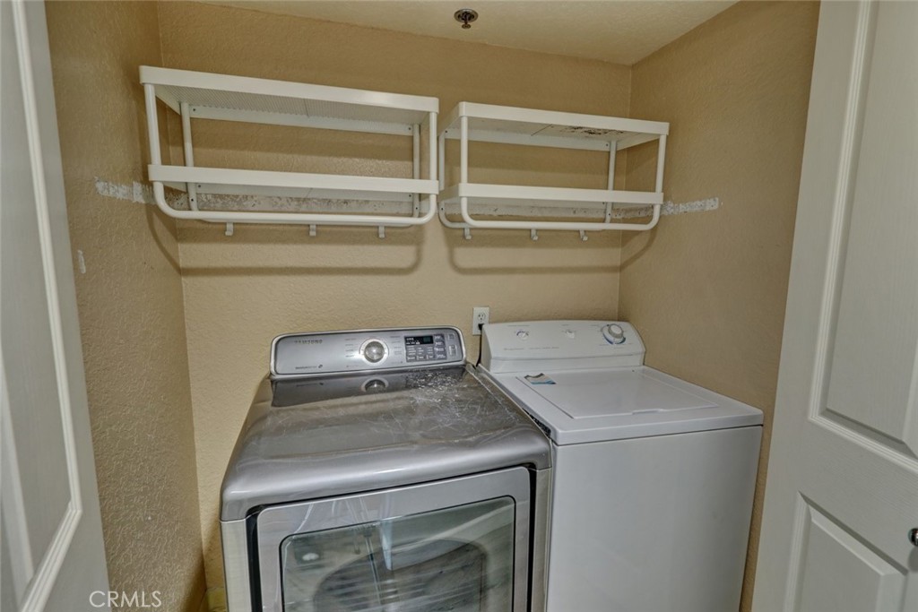 310 Lake Street Huntington Beach, CA 92648 - Photo 25 of 38 a utility room with dryer and washer
