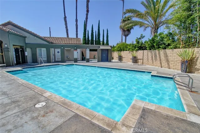 an aerial view of a house with a lot of city
