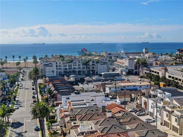 a terrace with outdoor seating and city view