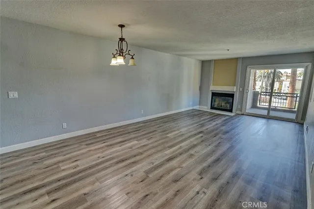 a view of a porch with a floor to ceiling window