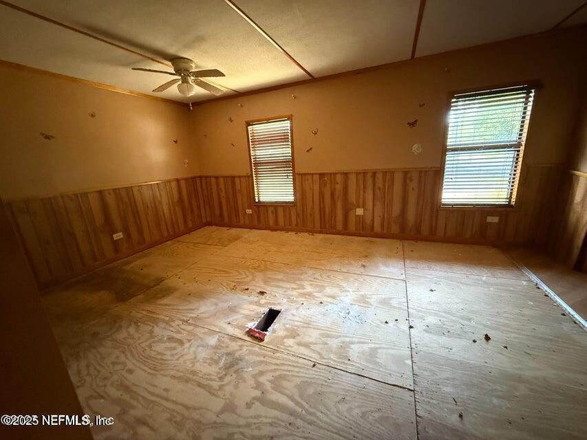 9324 Joos Road Jacksonville, FL 32220 - Photo 9 of 14 a view of an empty room with a window