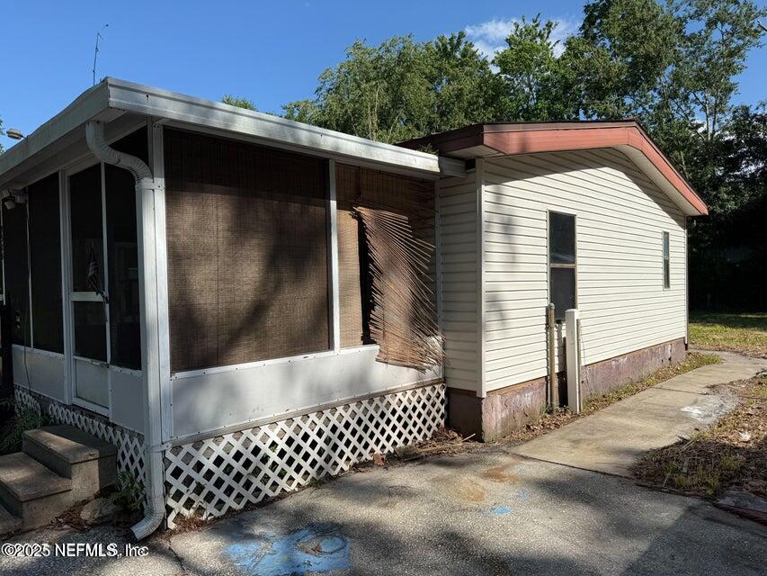 9324 Joos Road Jacksonville, FL 32220 - Photo 10 of 14 a front view of a house with a garage