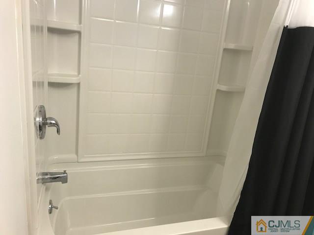 20 Burns Road, Unit 20 North Brunswick, NJ 08902 - Photo 11 of 18 a bathroom with a shower