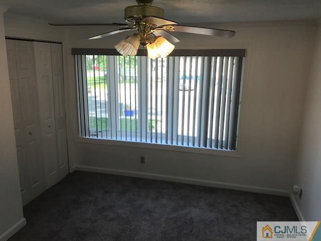 20 Burns Road, Unit 20 North Brunswick, NJ 08902 - Photo 8 of 18 a view of an empty room with a window