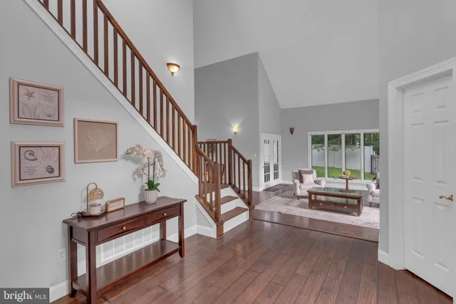 a bathroom with a sink mirror and vanity