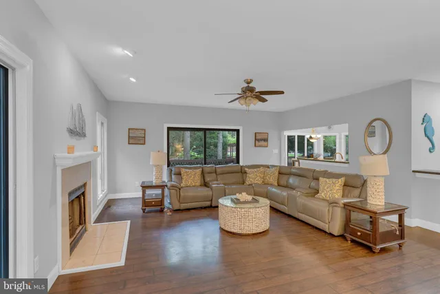 a bedroom with a bed couch and window