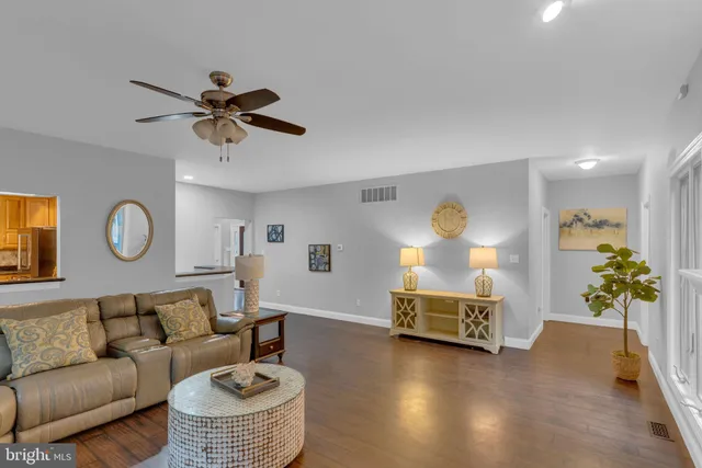 an aerial view of a house with a yard and garden