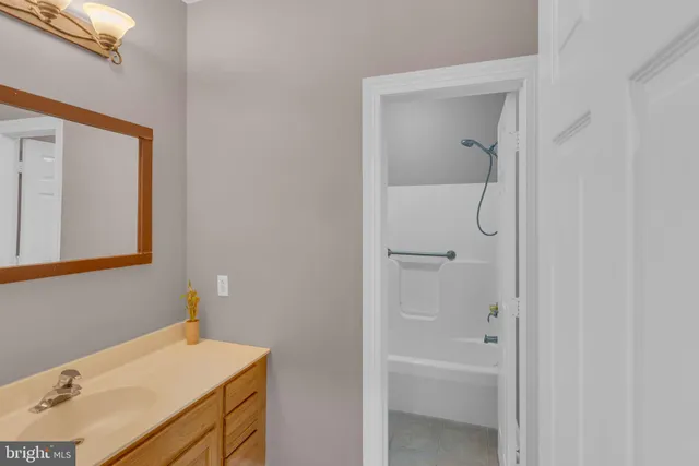 a view of a patio with couches table and chairs and potted plants