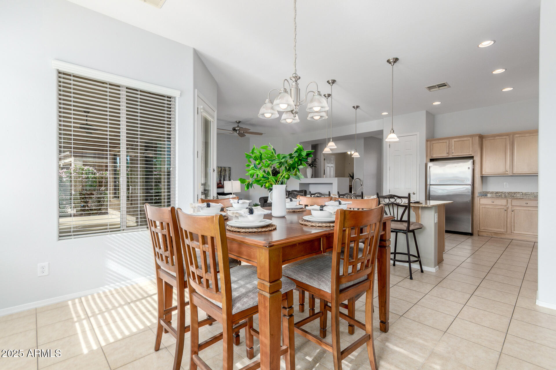 4553 East Narrowleaf Drive Gilbert, AZ 85298 - Photo 12 of 60 a view of a dining room and livingroom view