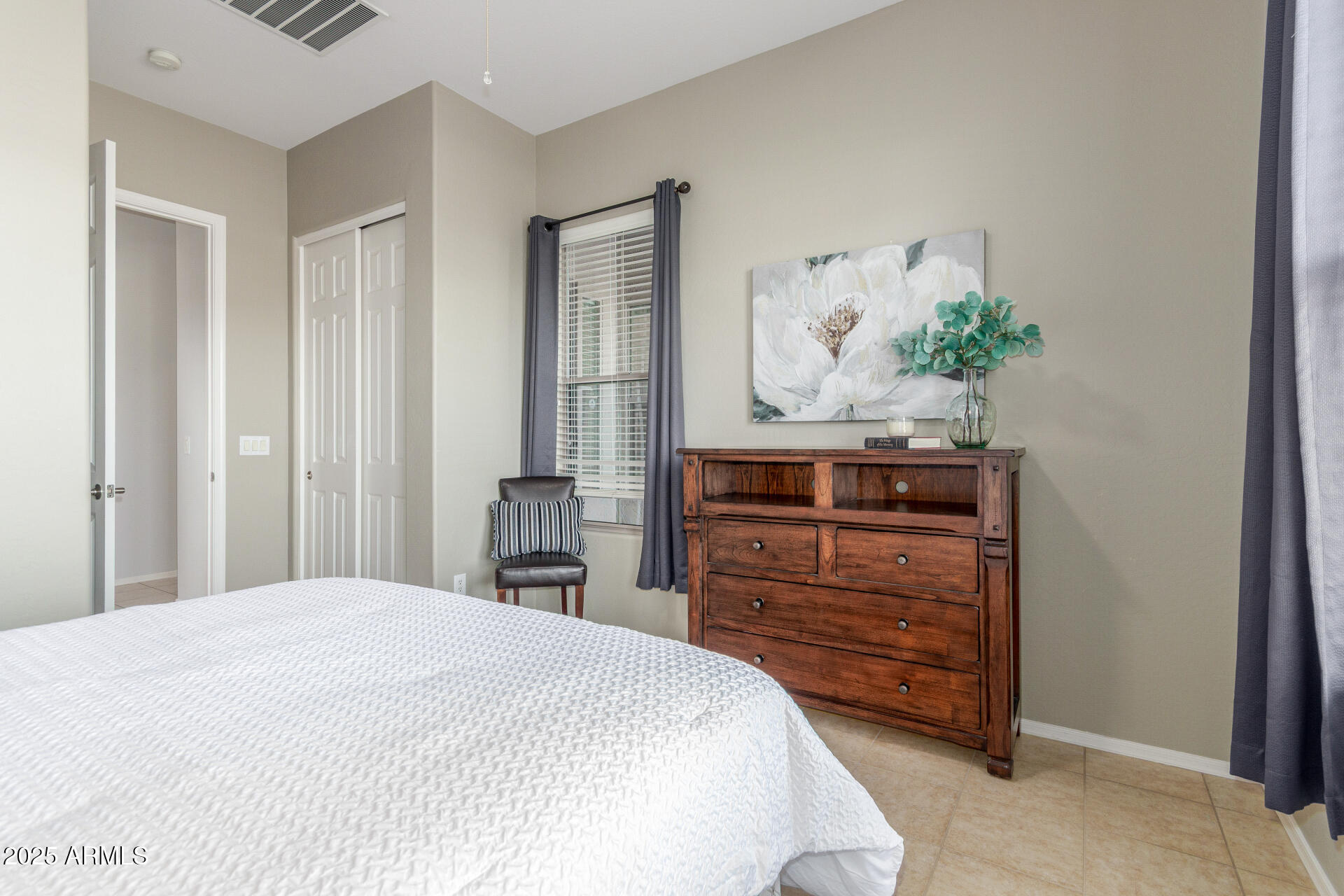 4553 East Narrowleaf Drive Gilbert, AZ 85298 - Photo 21 of 60 a bedroom with a bed and a dresser