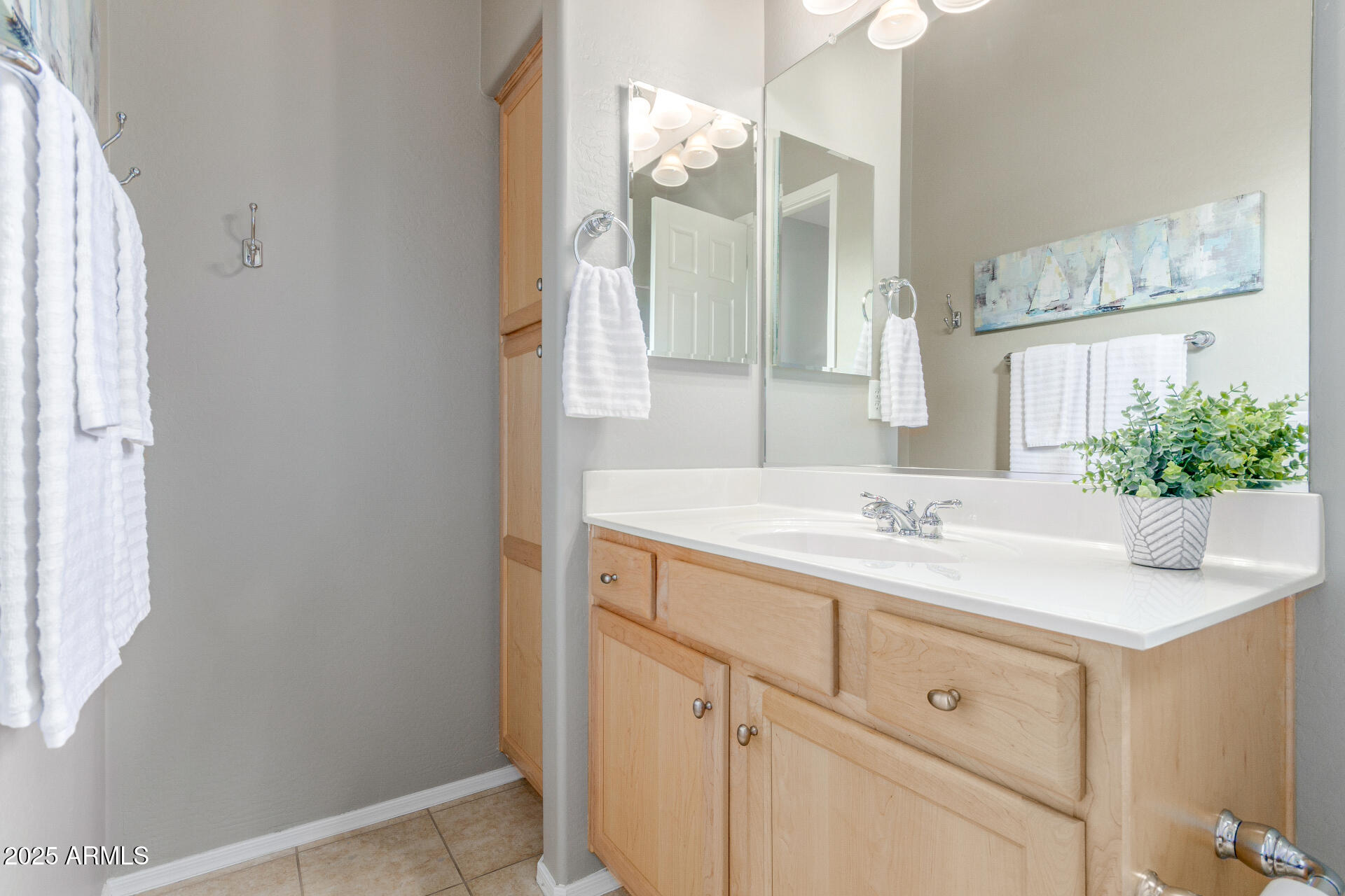 4553 East Narrowleaf Drive Gilbert, AZ 85298 - Photo 22 of 60 a bathroom with a granite countertop sink and a mirror