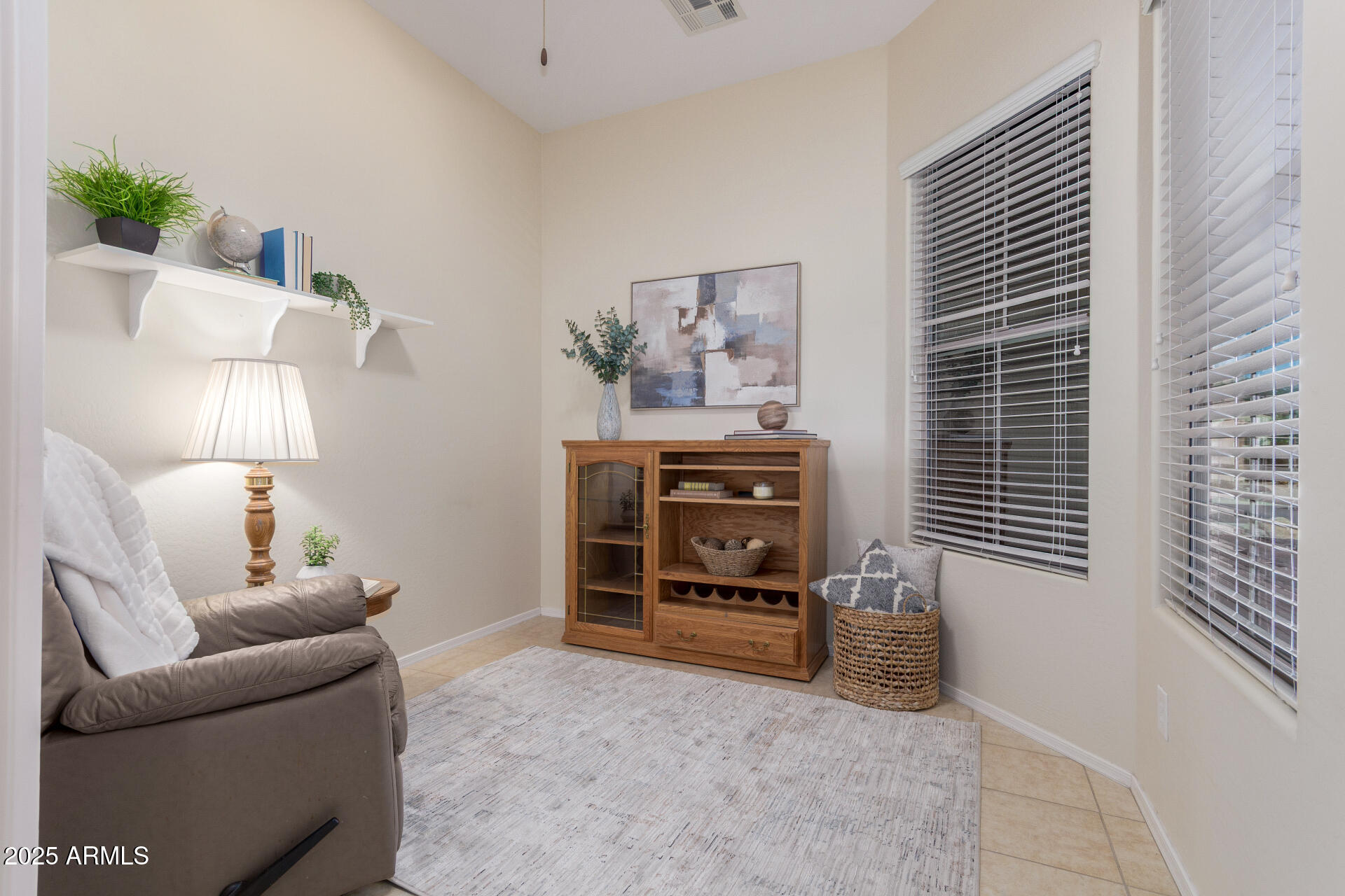4553 East Narrowleaf Drive Gilbert, AZ 85298 - Photo 24 of 60 a living room with furniture and a window