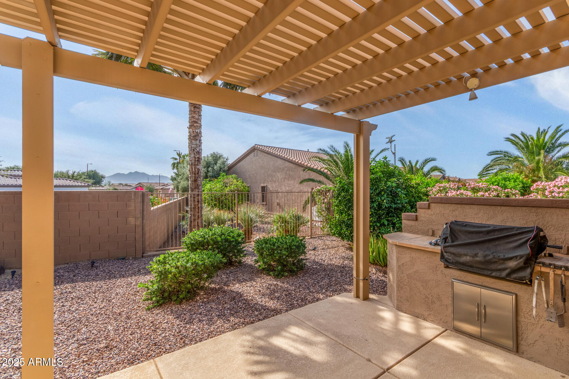4553 East Narrowleaf Drive Gilbert, AZ 85298 - Photo 29 of 60 a view of a porch with furniture and a yard