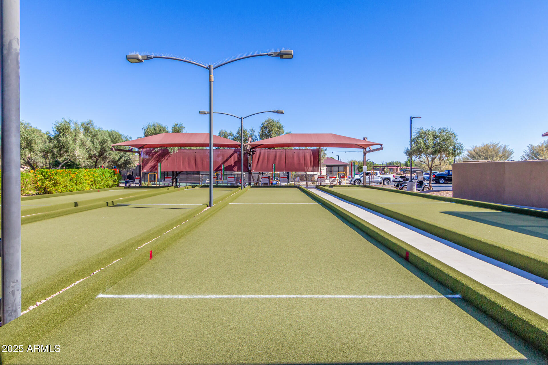 4553 East Narrowleaf Drive Gilbert, AZ 85298 - Photo 37 of 60 a view of a tennis ground with large trees