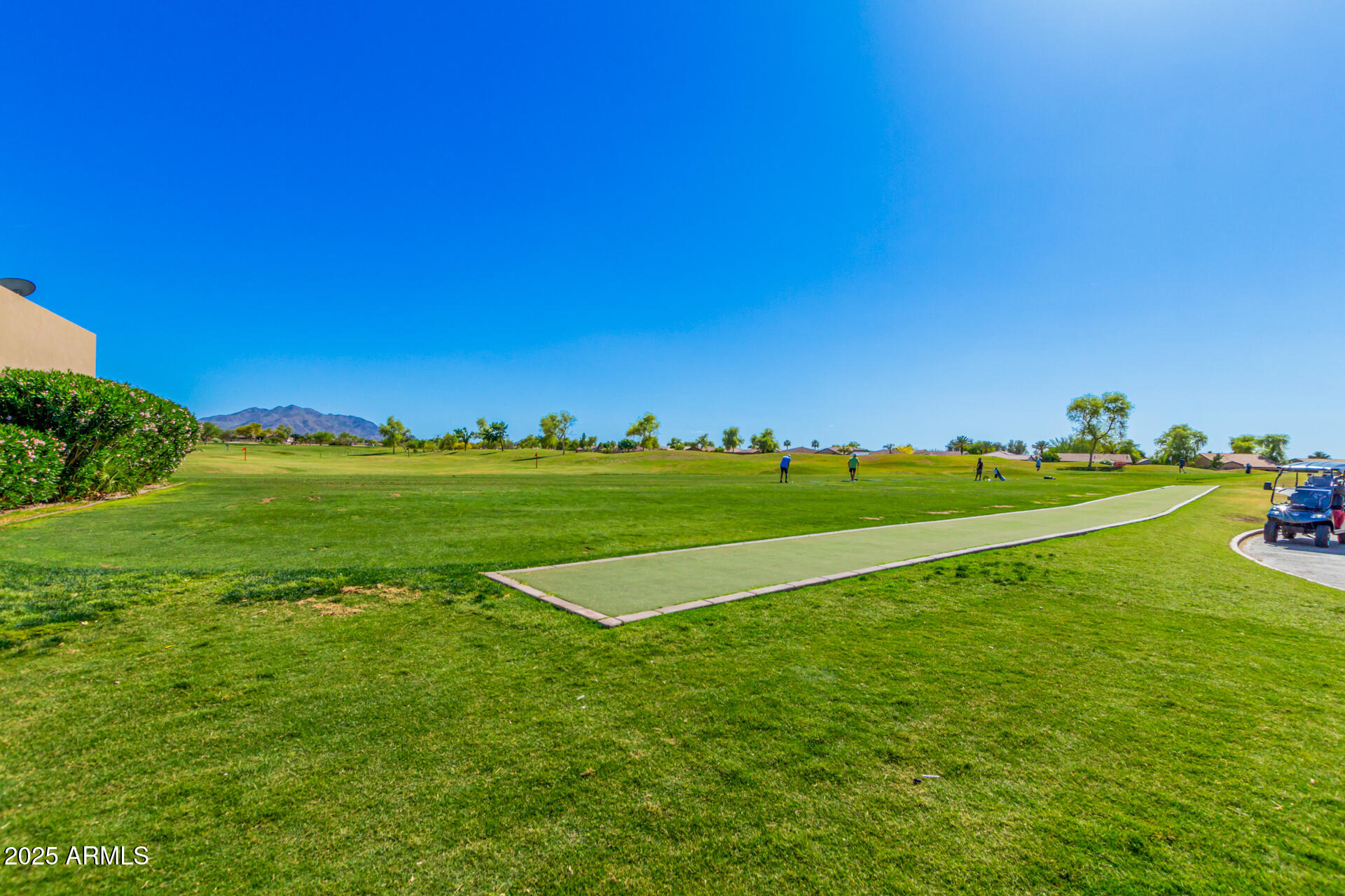 4553 East Narrowleaf Drive Gilbert, AZ 85298 - Photo 47 of 60 a view of a golf course with a lake