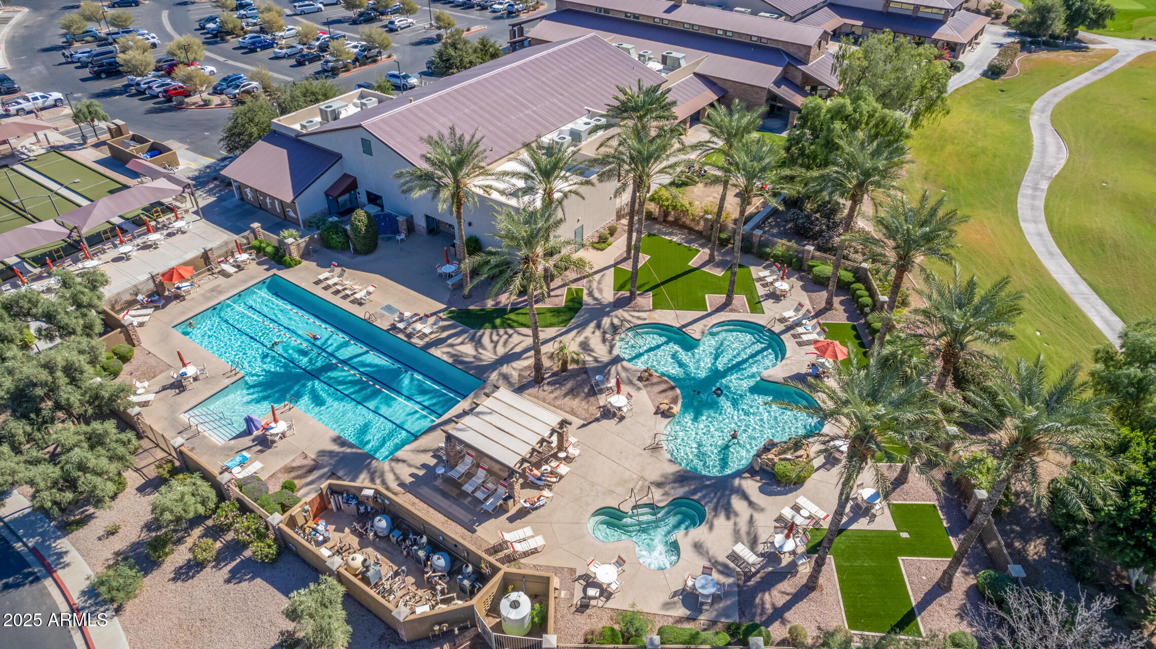 4553 East Narrowleaf Drive Gilbert, AZ 85298 - Photo 53 of 60 an aerial view of a house with a yard and swimming pool