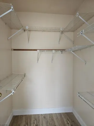 a view of a room with racks on the wall