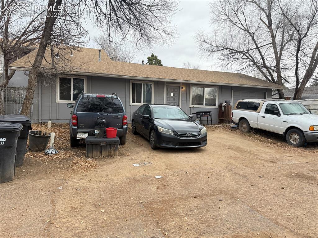 4191 Deerfield Hills Road Colorado Springs, CO 80916 - Photo 1 of 1 a view of a car parked in front of a building