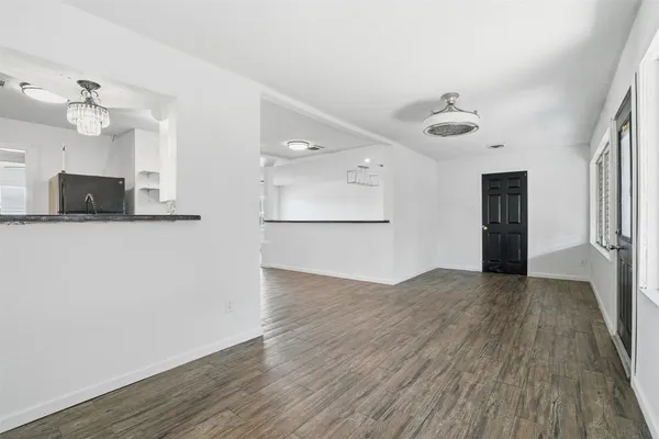 a view of a kitchen with a sink and a microwave