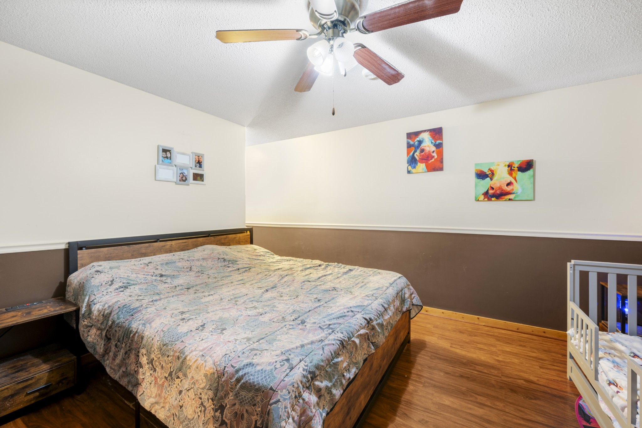 105 Flower Lane Paris, TN 38242 - Photo 15 of 25 a bedroom with a bed and a book shelf