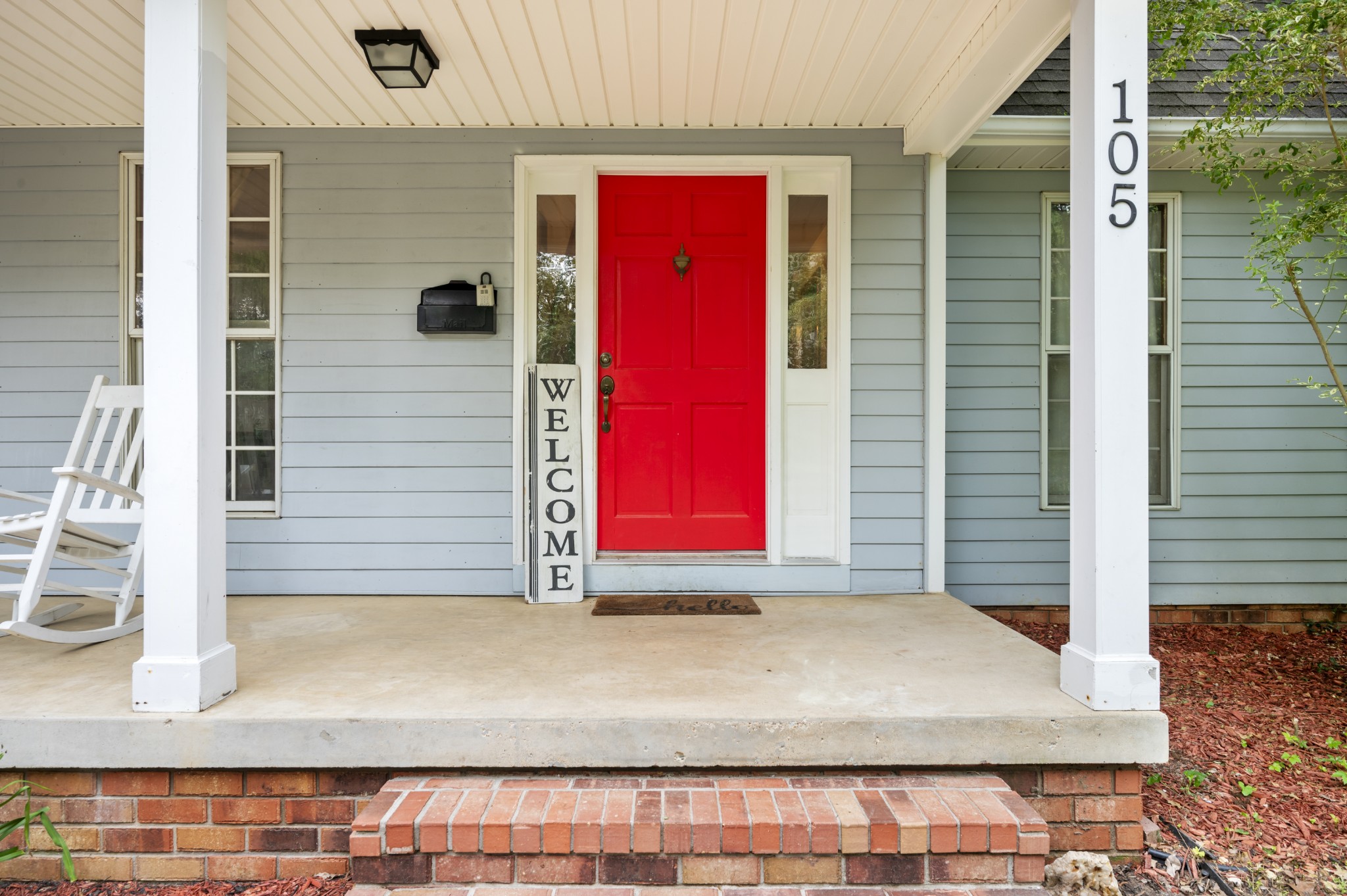 105 Flower Lane Paris, TN 38242 - Photo 2 of 25 a view of a wooden door of the house