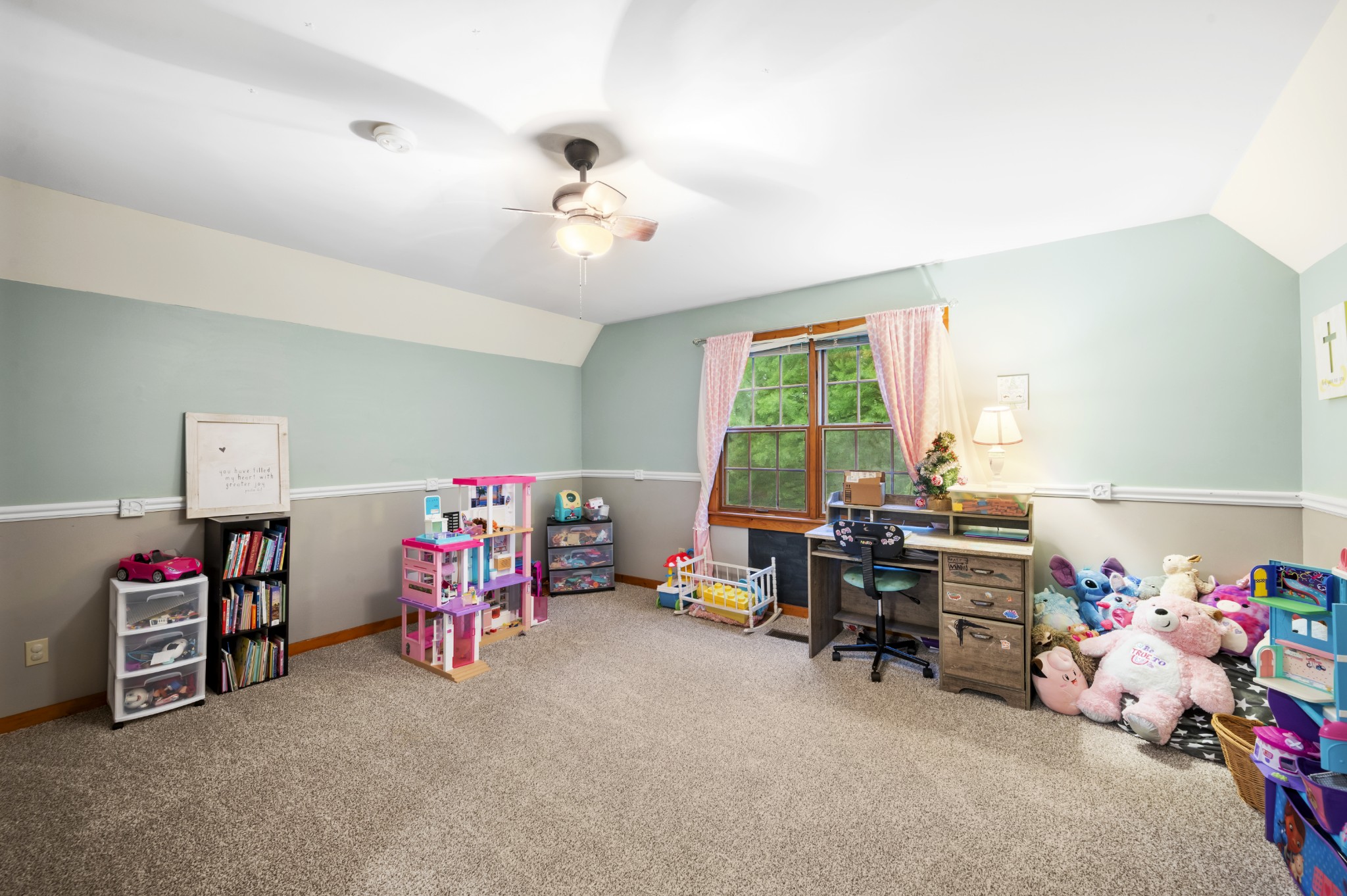 105 Flower Lane Paris, TN 38242 - Photo 22 of 25 a view of a livingroom with toys and a window