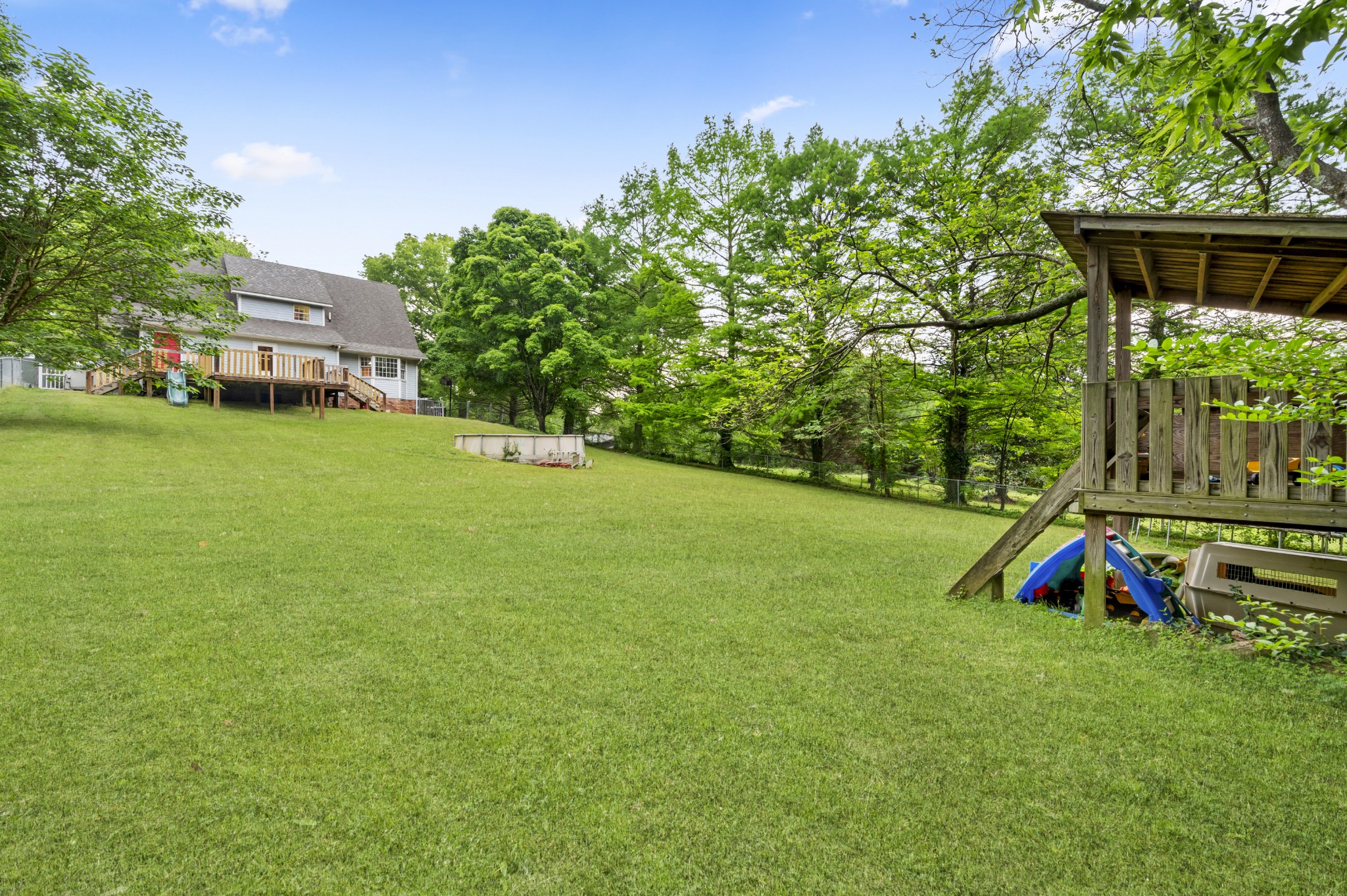 105 Flower Lane Paris, TN 38242 - Photo 6 of 25 a view of a house with a yard and sitting area