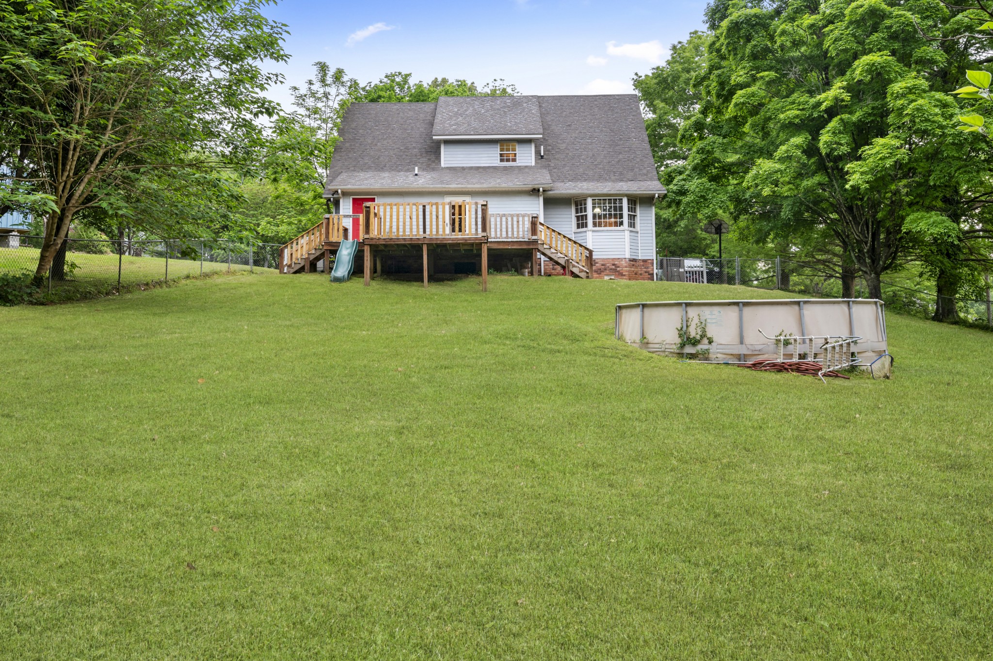105 Flower Lane Paris, TN 38242 - Photo 7 of 25 front view of a house with a yard