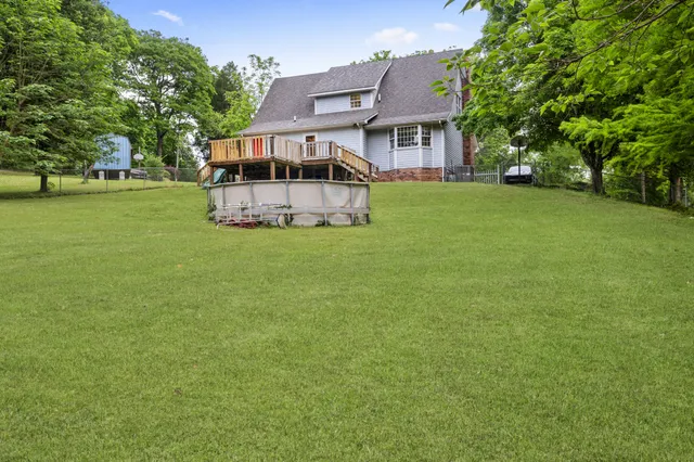 front view of a house with a big yard