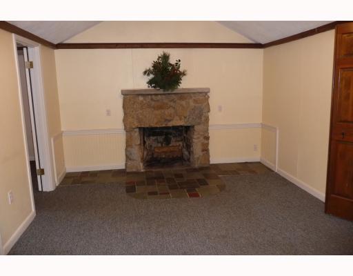 1467 Middle Road East Greenwich, RI 02818 - Photo 4 of 11 Living Room. Beautiful working fieldstone fireplace with cathedral ceilings.