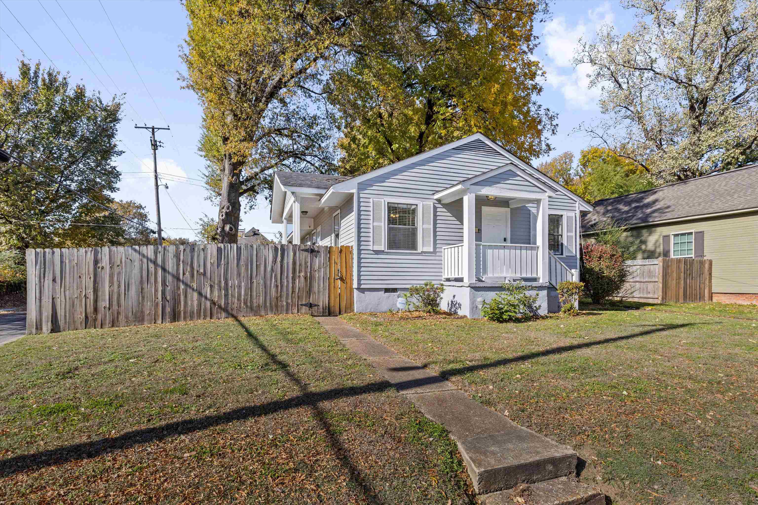 1011 Philadelphia Street Memphis, TN 38104 - Photo 2 of 26 a view of a brick house next to a yard with wooden fence